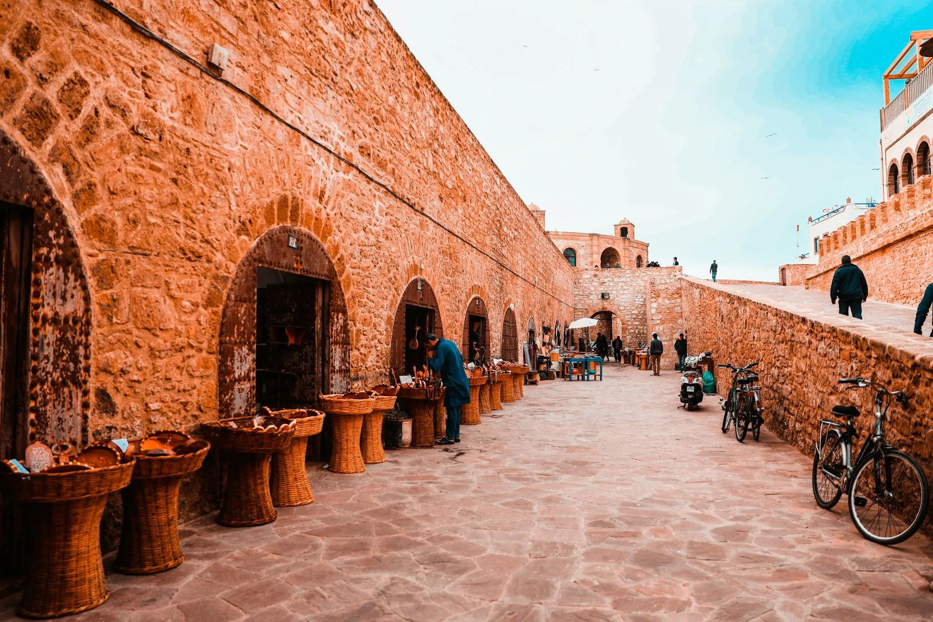 Stone arcades and craft stalls in the Kasbah of Essaouira, Morocco